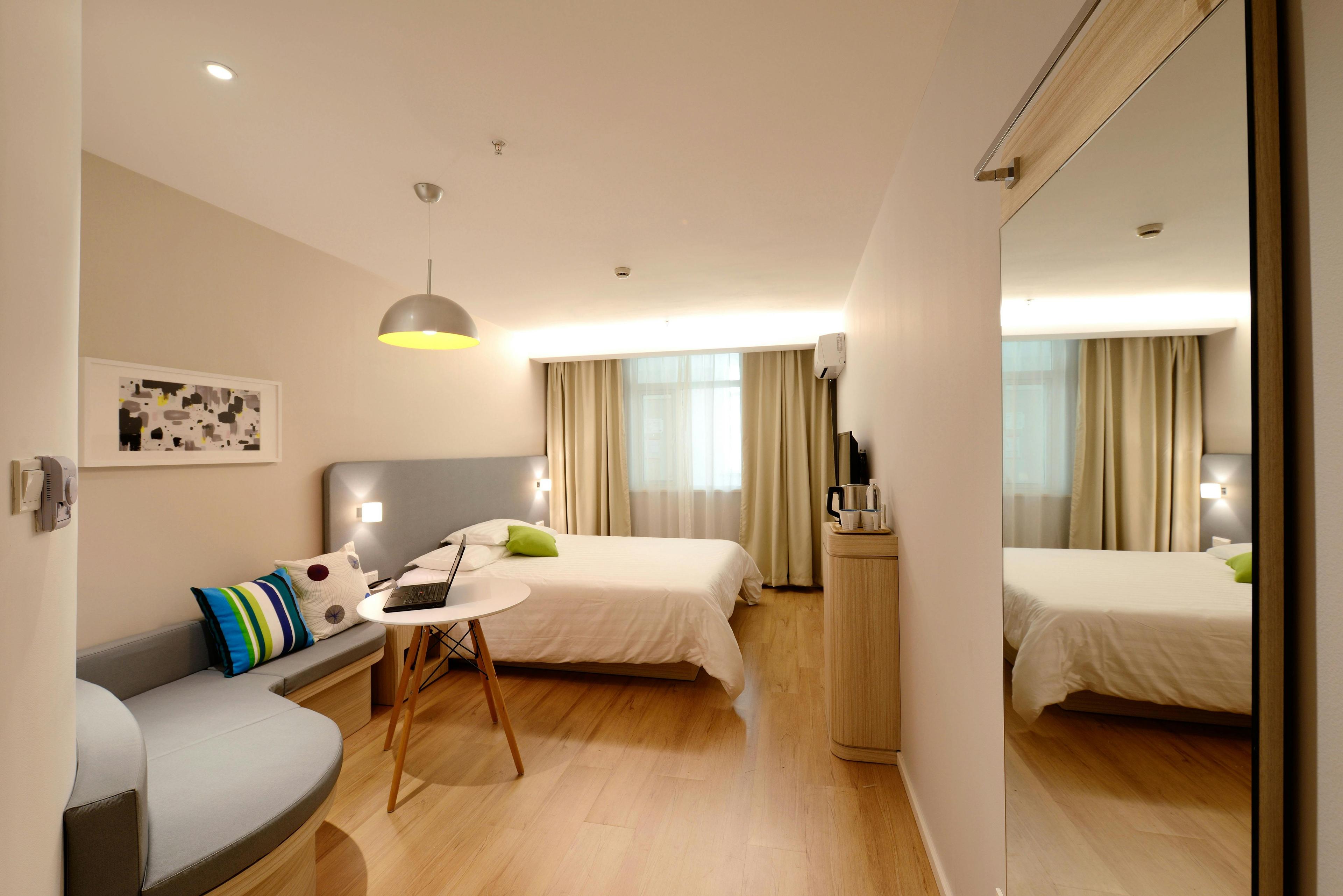 Compact kids' bedroom with neutral palette, Sector 50 Noida